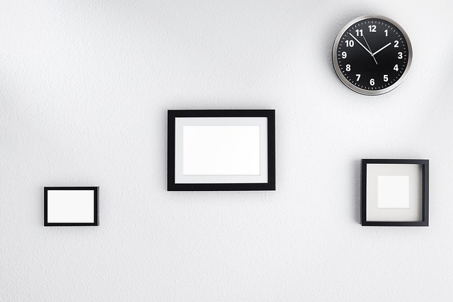 Photo frames and mirror on the walls